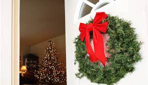 If you have any simple ideas on to hang christmas. How To Hang Holiday Decorations Without Damaging Your Front Door