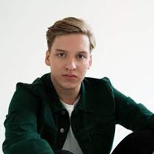 Probably named after george debeeson. George Ezra Youtube
