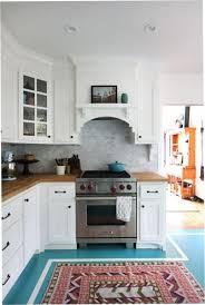 Turquoise Floor Butcher Block Counters White Cabinets My Dream Kitchen Home Spanish Style Home Classic Kitchen Design