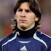 This soccer player's haircut calls for shaved sides and long hair at the center top that can be achieved using a hair gel. 3