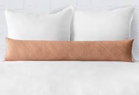 This brown leather sofa is cozy in a cottage, cabin, or a condo. 12 Leather Pillows That Make Your Sofa Look Luxe Instantly