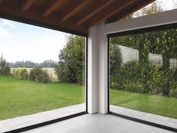 Laterali scorrevoli per chiusura tettoia, con finestre in cristal window, chiusure laterali. Chiusure Laterali Con Tende Avvolgibili Per Esterni