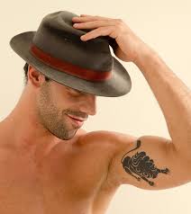 Traditional capricorn goat with rose flowers mens arm tattoo. 10 Brilliant Leo Tattoo Ideas