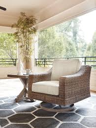 Beachcroft Swivel Lounge Chair With Cushion By Benchcraft At Virginia Furniture Market Patio Chairs Furniture Market Patio Decor