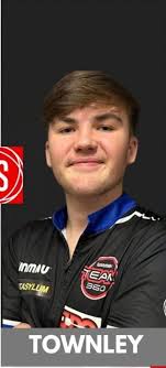 He's been playing darts all day, gets home and continues to play. Kid just  loves darts. Notice his boards lower at home so he can play by himself and  collect his own