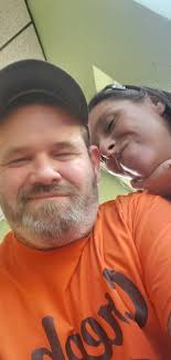 This is my wife and me. Im proud of her. We've been through alot together.  The lord has saved our marriage and put us