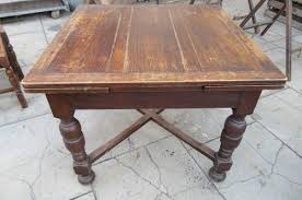 An extendable dining table produced in france in the 1930's in rosewood on oak, a stunning centre column with heavy brass detail around the lower section, the top extends. Antique 1930s Oak Draw Leaf Dining Table Antiques Atlas