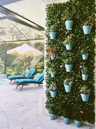Vertical Living Wall Made Easy With Hangapot The Hidden Flower Pot Hanger Flower Pots Outdoor Container Garden Design Small Space Gardening