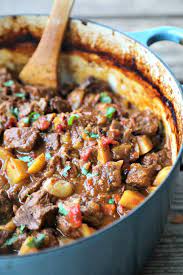 Curried Beef Oven Stew Is Filled With Tender Beef Cubes Potatoes Carrots Onions Slow Cooked In A Flavou Beef Curry Stew Beef Stew Recipe Lamb Stew Recipes