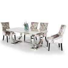 With a pair of stunning mirrored pillars serving as the table's base, this beautiful rectangular pedestal table doubles as a piece of art for your dining room. Kesley Cream Marble Top Dining Table With 4 Acton Mink Chairs Lovehomestyle