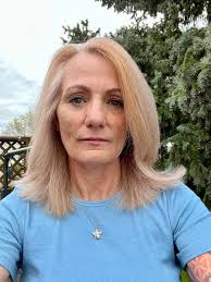 Smoothing skin wrinkles in photo for work profile?