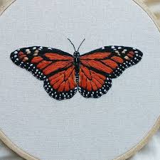 This monarch butterfly embroidery patch is stitched on cream felt and is perfect to add to your kids backpack a colorful festive monarch butterfly in pattern style on black for a classic classy look. Completed Monarch This Lil Baby Will Be Headed To It S New Home Soon Monarchbutterfly Monarch Embroi Animal Embroidery Butterfly Embroidery Embroidery Art