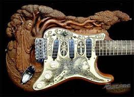 La Guitare En Bois Sculpte Ou Carved Guitar Guitar Design Guitar Cool Guitar
