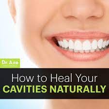 How To Reverse Cavities Naturally And Heal Tooth Decay Dr Axe Heal Cavities Teeth Health Reverse Cavities