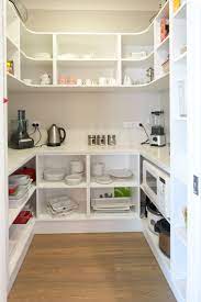 One chalkboard is a grocery list so you can write down what you're running out of, the other chalkboard is a dinner planner. A Walk In Pantry Is A Great Storage Saver But Also Has A Little Bit Of A Glam Feel To It Like This One From Kitchen Pantry Design Pantry Layout