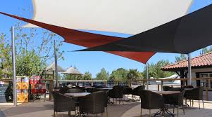 The mounting fixtures for the shade sail needed to be larger than the 16.5' square to allow the fabric to be tensioned properly. Shade Sails Nz Shade Cloths Sun Sail Outdoor Canopies Sunnyside