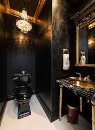 Large scale black tiles and a textural black tile wall in the shower for a modern look. Trend Black Bathrooms
