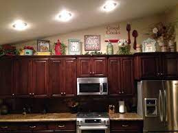How To Decorate On Top Of Cabinets With Vaulted Ceiling Google Search Decorating Above Kitchen Cabinets Above Kitchen Cabinets Kitchen Cabinets Decor