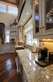 Marble, granite, quartz, quartzite, sinks, cleaners. Giallo Capela Granite With Cove Dupont Edge Mediterranean Kitchen Boston By Select Stone Houzz