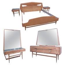 All i can tell you of the history is that my mom told me that it was the first furniture she and dad bought after they were married, which is why i dated it 1950's, that and it looks like the space age furniture i've seen from that era. 1950s Bedroom Sets 34 For Sale At 1stdibs