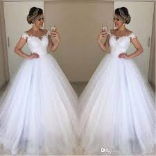 With our taffeta ballgown dresses, you will feel sleek and modern at your dream wedding venue. 2020 White Jewel Neck Lace Wedding Dresses Ball Gown Appliques With Detachable Train Long Bridal Gowns White Wedding Gown Plus Size Celtic Wedding Dress Cheap Wedding Dresses Plus Size From Weddingpalace 142 82
