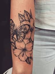 Doctor Bird Instead Of Butterfly With Hibiscus Forarm Tattoos Tattoos Butterfly Tattoos For Women