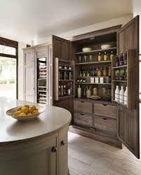 Follow a similar route and look for sleek and sophisticated kitchen pantry elements that boast a generous ode to minimal, thoroughly modern. Modern Pantry Ideas That Are Stylish And Practical Kitchen Larder Kitchen Design Modern Pantry Cabinets