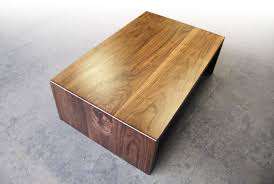 48″ length x 18″ depth x 11.5″ height. Brandner Design Walnut Waterfall Coffee Table