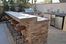 Shop prefab bbq islands online. A Large Bbq Counter Combo For Entertaining Large Groups Outdoor Kitchen Island Outdoor Bbq Kitchen Outdoor Kitchen Design