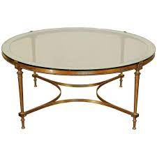 Check spelling or type a new query. French Brass And Silvered Brass Round Coffee Table With Ringed Mirror Glass Top At 1stdibs