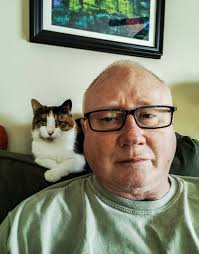 When a cat chooses you. I rescued her from the back yard of our parish  priest, who was very allergic to cats. She was so tiny. I already had a cat  and