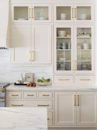 Kitchen cabinetry can attract the right buyer, so think about creating a space unlike the soft colors for painted kitchen cabinets, the trend for wood cabinets is to stain with a rich, dark color. 6 Cream Kitchen Cabinets To Help You Think Beyond All White Kitchen Cabinet Design Beige Kitchen Cabinets Beige Kitchen