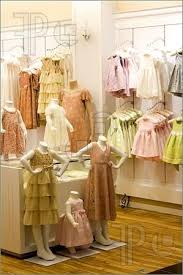 Image Of Children S Clothes In A Shop Storing Kids Clothes Childrens Clothing Stores Kids Clothing Store Design
