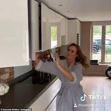 Stop the slam with this soft close adapter that quietly and smoothly closes cabinet doors. Amanda Holden Dashes Through Her Kitchen Slamming Cabinet Doors Daily Mail Online