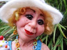 I've been wanting to make this for a very long time. I got Christi's  tutorial for this during the pandemic and never tried making it. I changed  the background by using apoxie