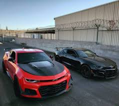 Black And Red Camaro Two Chevrolet Camaro Zl1 1le S Painted In Red Hot And Black Photo Taken By Zl1 Murka On Instagram Red Zl1 1le Owned Car Wheels Ford Mustang Car Camaro Car
