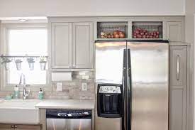 A local cabinet maker will be able to determine what the best way to handle the situation is. How To Maximize That Awkward Space Above The Fridge