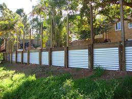 Pin By Kerri Steenbeeke On Corrugated Iron Backyard Retaining Walls Landscaping Retaining Walls Cheap Retaining Wall
