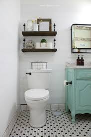 For storing towels, toilet paper and other bathroom items, consider installing a shelf, a cabinet or stacking baskets over the toilet to hold these items. How To Reinvent Your Bathroom With Over The Toilet Shelves