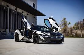 Bmw I8 Gets Eye Catching Camo Wrap Design Carscoops Bmw I8 Bmw Luxury Cars Bmw