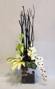 Pin By Micheline Geise On Arrangements Contemporary Flower Arrangements Tropical Flower Arrangements Modern Flower Arrangements