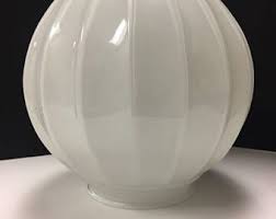 Our replacement lighting shades come from leading manufacturers such as access lighting, design classics lighting, minka aire and quorum lighting when it comes to shapes, cylinders and ovals are popular for wall sconces, while bell and conical shades are often used for table lamps or area lights. 6 Inch Replacement Glass Light Globe With Ribs For Ceiling Sconce Swag Replacement Glass Shades Glass Light Globes Vintage Lighting
