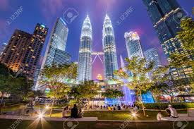 We'd like to go somewhere for good local food (e.g. Kuala Lumpur Malaysia July 21 Night View Of The Petronas Stock Photo Picture And Royalty Free Image Image 111724355
