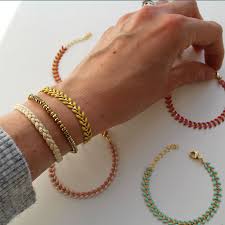 Bracelet Riviera En Tresse Lurex Doree Porte Avec Le Bracelet Pegase En Hematite Doree Et Le Bracelet Freesia En Chain Bijoux Fait Main Creation Bijoux Bijoux