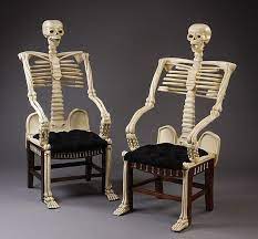 2 carved mahogany skeleton chairs tufted seat cushion chair carving