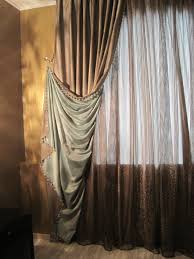 Dark curtains bring along with them a variety of advantages and are available in a wide array of hues. A Dramatic Pulled Back Drape Contrast Lined And Complimented With A Copper Sheer Delightful With Images Curtains Art Deco Curtains Stylish Curtains