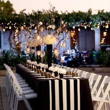 These engagement party games will break the ice, add some friendly competition to the mix, and ask your guests to put their memories to the test. 10 Unique Engagement Party Theme Ideas For An Unforgettable Soiree Wedpics Blog White Weddings Reception Black And White Tablecloth Black White Wedding