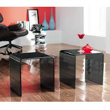 The concho table makes a bold statement with its minimal form and rich architectural materials. Pair Of Black Glass Side Tables Abode Interiors