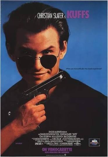 Kuffs (1992). With 3 movies spent deep in the trenches of teenage  existentialism, it was finally time for Christian Slater to wax slack about  being in one's 20s in the 90s. You