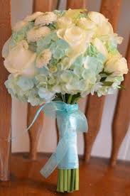 Tiffany centerpieces silk flower centerpieces quinceanera centerpieces bridal shower centerpieces centerpiece decorations wedding decorations quince the tiffany blue wedding theme has been growing in popularity and has been used by many celebrities during their weddings, like toni braxton. Flour And Flower Designs Tiffany Blue Wedding Theme Tiffany Blue Weddings Winter Wedding Flowers